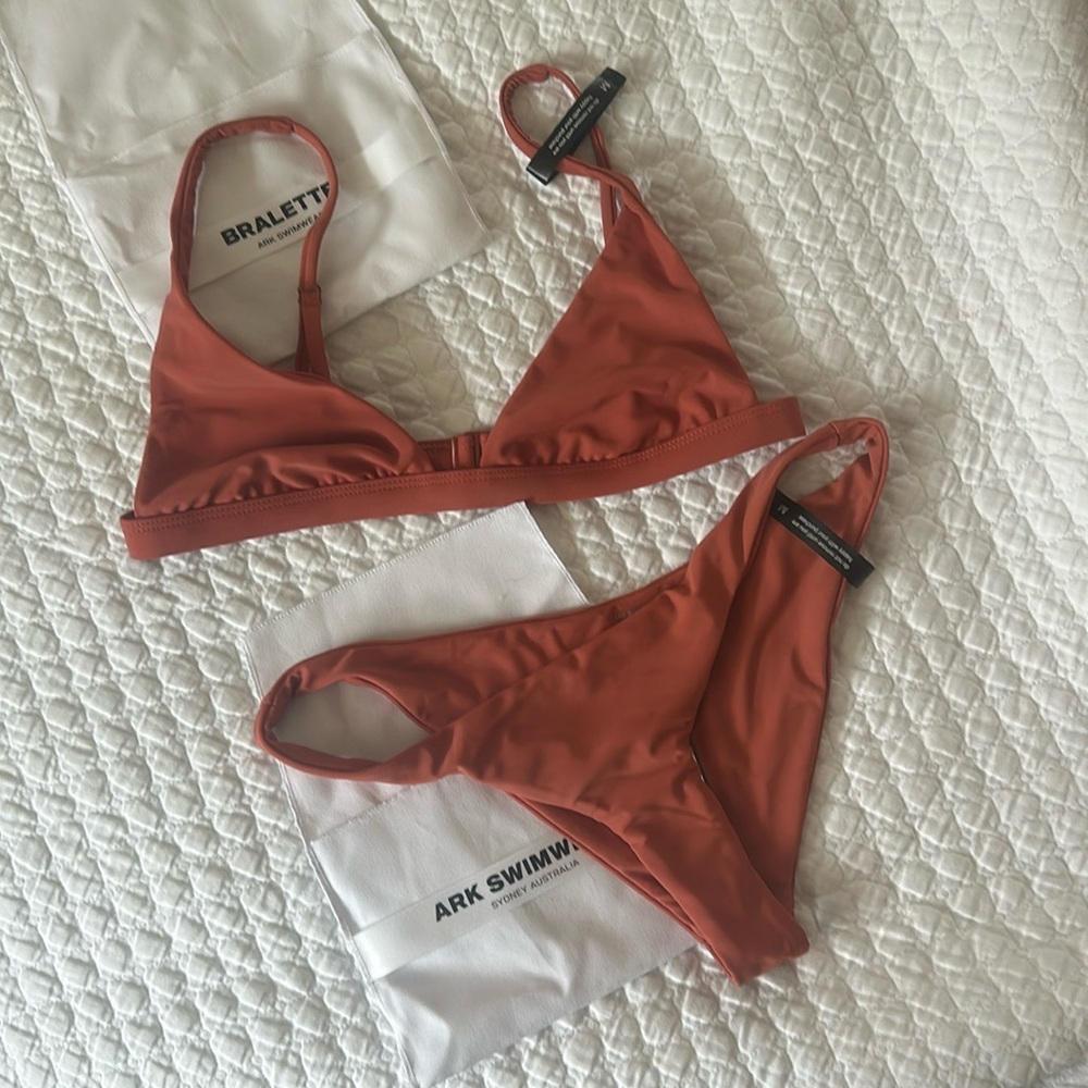 Ark Swimwear rust bralette and cheeky bottoms size medium.